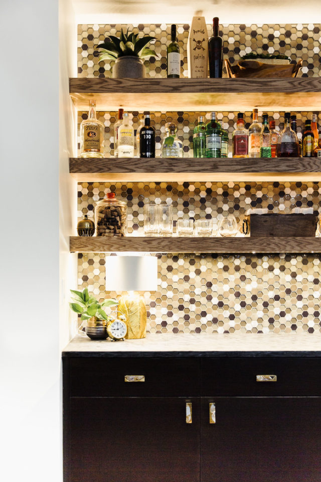 bar with glass tile backsplash