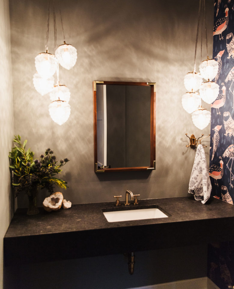 bathroom with stone countertops