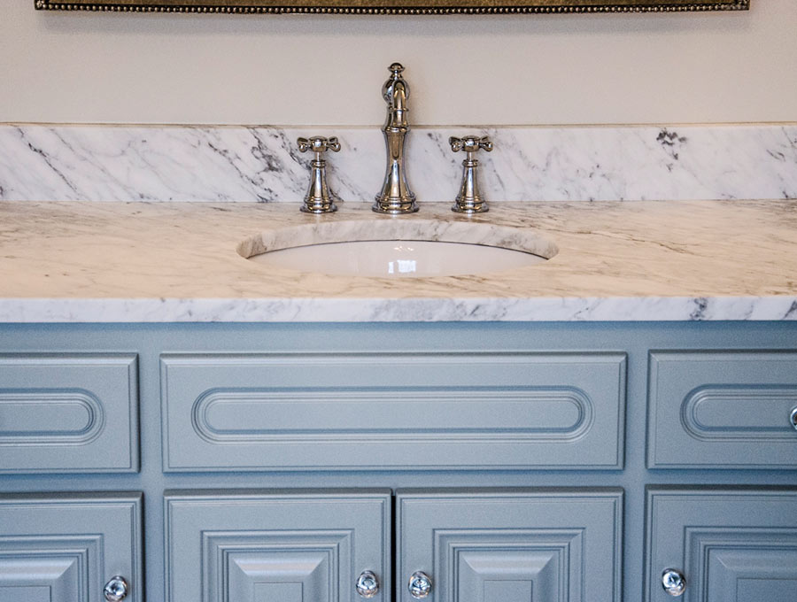 bathroom vanity with marble countertop