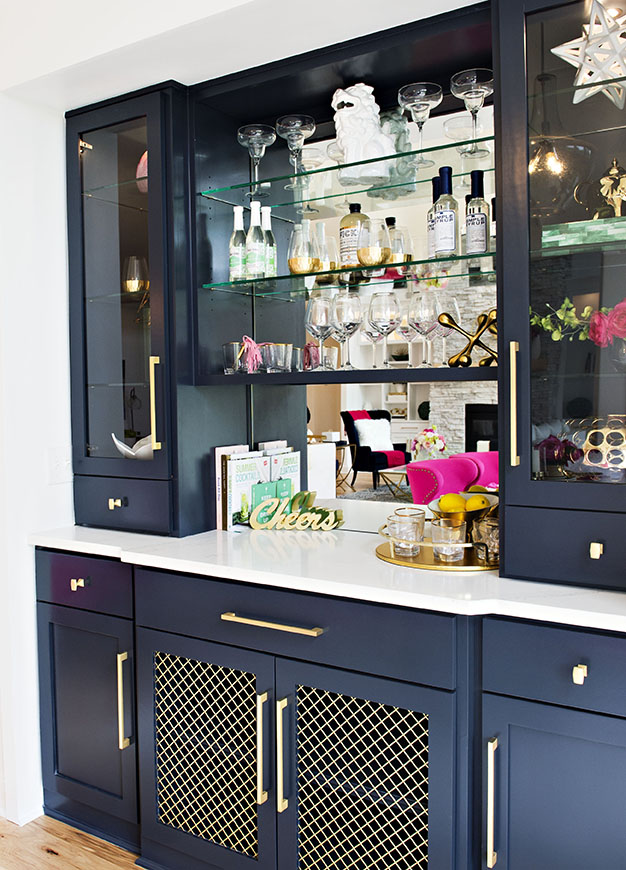 wet bar with navy cabinets